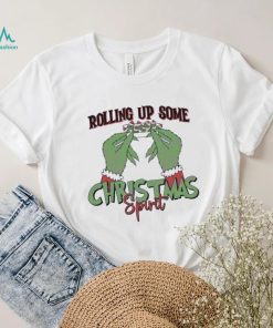 Funny the grinch hand rolling up some Christmas shirt