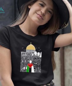 A boy wearing Free Palestine flag shirt