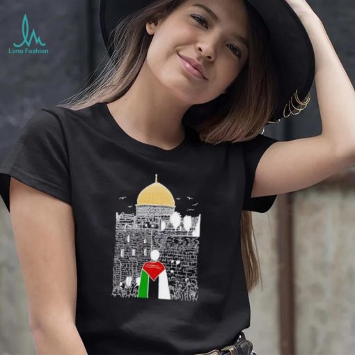 A boy wearing Free Palestine flag shirt