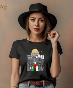 A boy wearing Free Palestine flag shirt