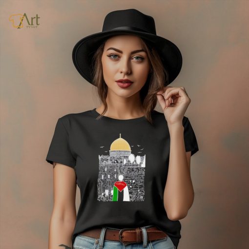 A boy wearing Free Palestine flag shirt