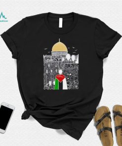 A boy wearing Free Palestine flag shirt