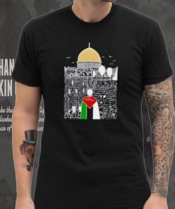 A boy wearing Free Palestine flag shirt