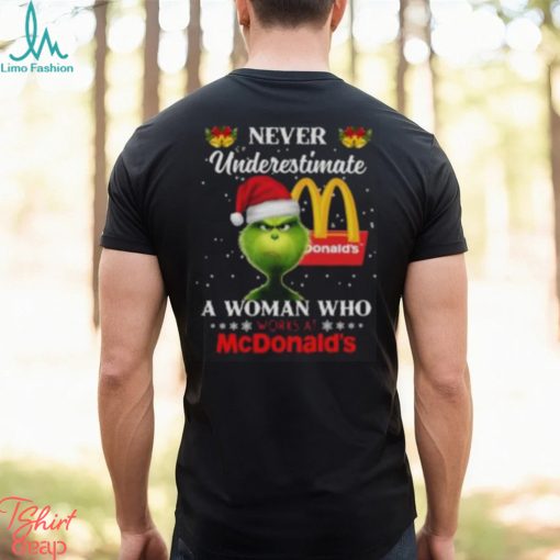 Christmas 2023The Grinch Santa Hat Never Underestimate a Woman who Works at McDonald’s shirt