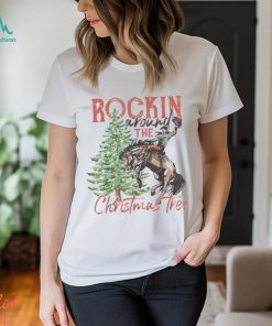 Rocking Around The Christmas Tree Christmas Cowboy Horse Essential Shirt, hoodie, sweater, long sleeve and tank top Rocking Around The Christmas Tree Christmas Cowboy Horse Essential Shirt