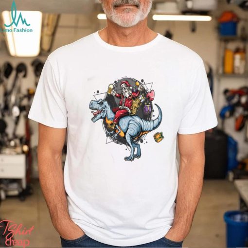 Santa Claus Christmas Riding Rex Dinosaur And Carrying Gifts Essential Shirt