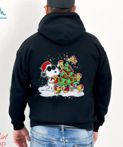 Snoopy and Woodstock in Santa hat decorate the pine tree Christmas shirt