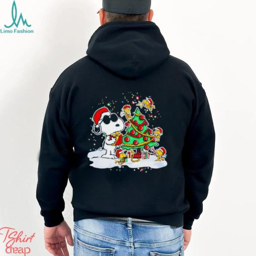 Snoopy and Woodstock in Santa hat decorate the pine tree Christmas shirt