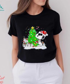 Snoopy and snowman next to the pine tree Christmas shirt