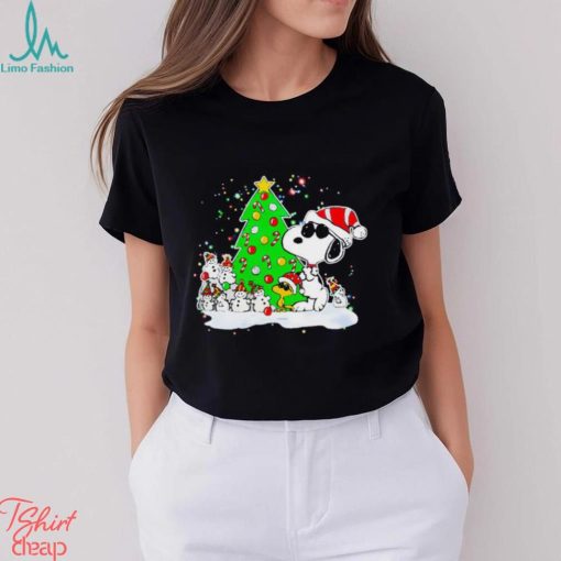 Snoopy and snowman next to the pine tree Christmas shirt