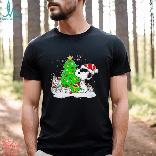 Snoopy and snowman next to the pine tree Christmas shirt