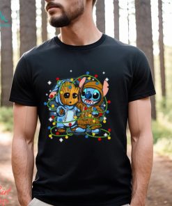 Stitch And Baby Groot Christmas Lights Essential Shirt, hoodie, sweater, long sleeve and tank top Stitch And Baby Groot Christmas Lights Essential Shirt