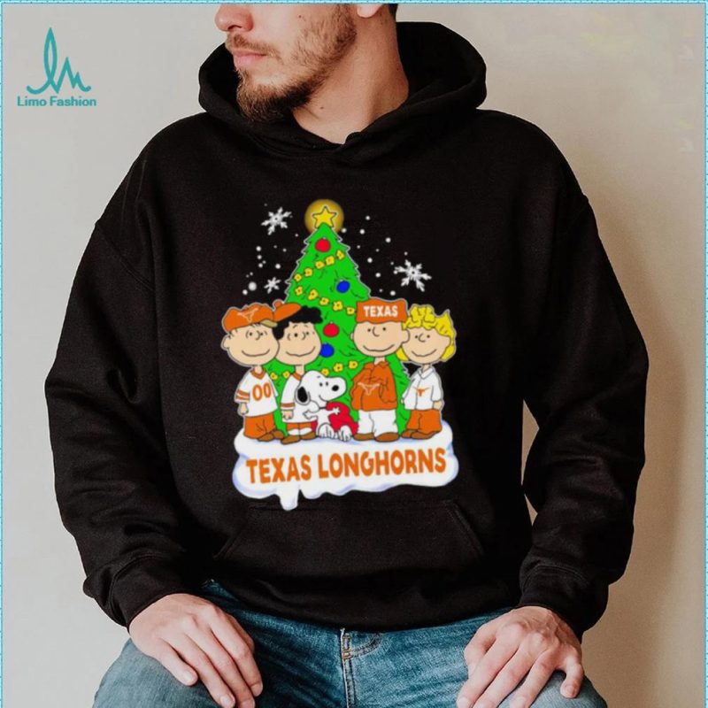 https://img.limotees.com/photos/2023/11/Happy-Merry-Christmas-Peanuts-Christmas-tree-Texas-Longhorns-football-logo-gift-shirt0-800x800.jpg