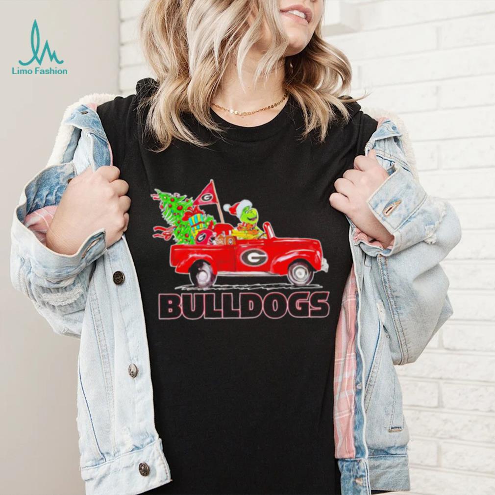 Happy Merry Christmas The Grinch drive a car Georgia Bulldogs football logo flag gift shirt Happy Merry Christmas The Grinch drive a car Georgia Bulldogs football logo flag gift shirt