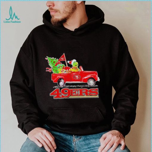 Happy Merry Christmas The Grinch drive a car San Francisco 49ers football logo flag gift shirt