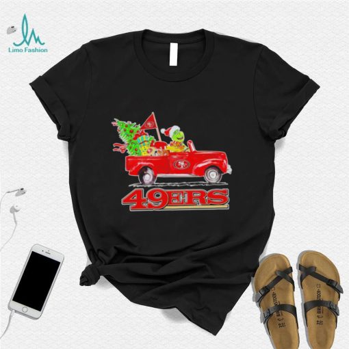 Happy Merry Christmas The Grinch drive a car San Francisco 49ers football logo flag gift shirt