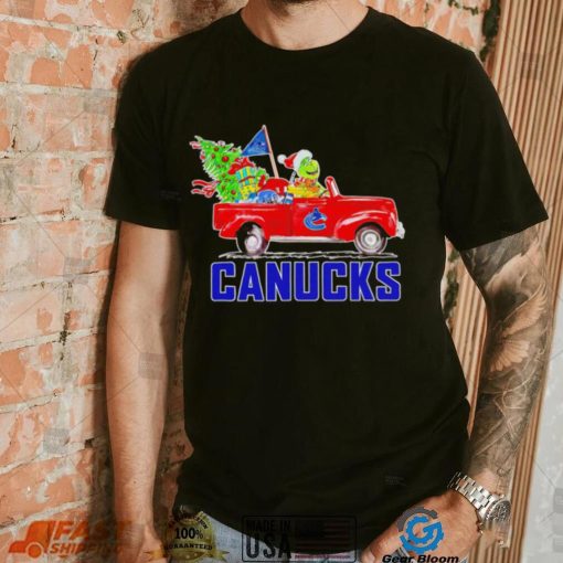 Happy Merry Christmas The Grinch drive a car Vancouver Canucks ice hockey logo flag gift shirt