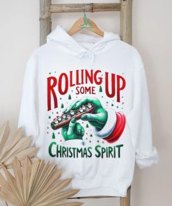 Rolling up some Christmas spirit Grinch hand shirt