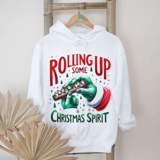 Rolling up some Christmas spirit Grinch hand shirt