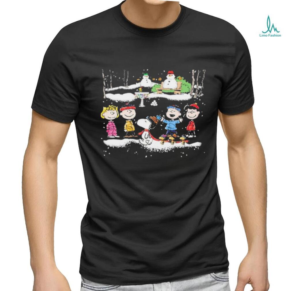 Snoopy and team Peanuts playing in snow Christmas 2023 t shirt Snoopy and team Peanuts playing in snow Christmas 2023 t shirt