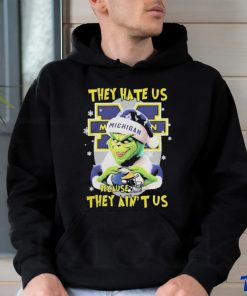 They Hate Us Because Ain’t Us The Grinch Hand Love Michigan Wolverines Christmas Shirt