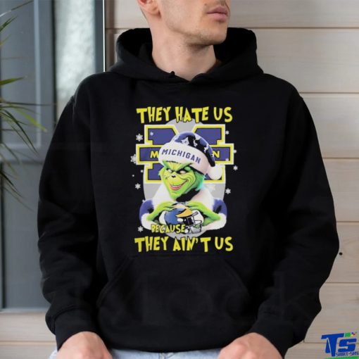 They Hate Us Because Ain’t Us The Grinch Hand Love Michigan Wolverines Christmas Shirt