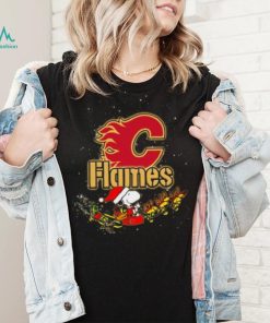 Calgary Flames NHL Santa Snoopy and Woodstock Christmas T Shirt, hoodie, sweater, long sleeve and tank top Calgary Flames NHL Santa Snoopy and Woodstock Christmas T Shirt