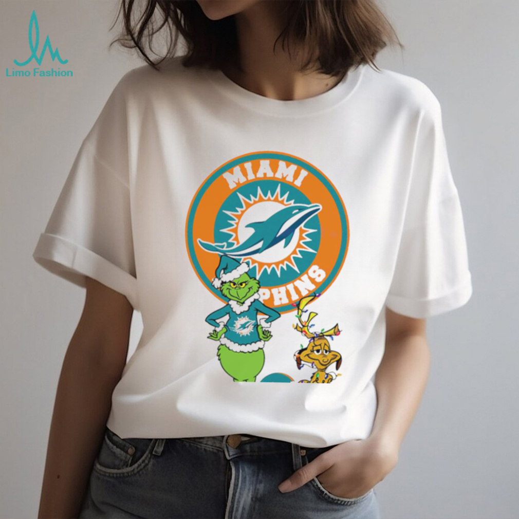 Grinch and Max dog NFL Miami Dolphins football helmet logo shirt Grinch and Max dog NFL Miami Dolphins football helmet logo shirt