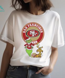 Grinch and Max dog NFL San Francisco 49ers football helmet logo shirt, hoodie, sweater, long sleeve and tank top Grinch and Max dog NFL San Francisco 49ers football helmet logo shirt