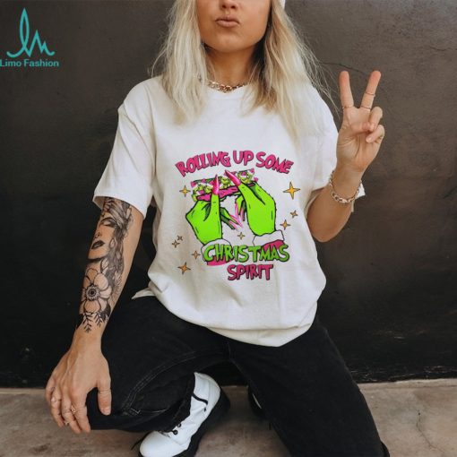 Grinch rolling up some Christmas spirit shirt