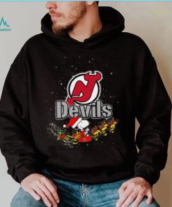 New Jersey Devils NHL Santa Snoopy and Woodstock Christmas T Shirt, hoodie, sweater, long sleeve and tank top New Jersey Devils NHL Santa Snoopy and Woodstock Christmas T Shirt