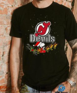 New Jersey Devils NHL Santa Snoopy and Woodstock Christmas T Shirt, hoodie, sweater, long sleeve and tank top New Jersey Devils NHL Santa Snoopy and Woodstock Christmas T Shirt