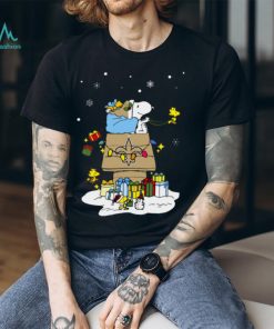 New Orleans Saints Santa Snoopy Wish You A Merry Christmas Shirt, hoodie, sweater, long sleeve and tank top New Orleans Saints Santa Snoopy Wish You A Merry Christmas Shirt