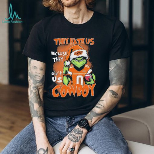 Official The Grinch They Hate Us Because Ain’t Us OSU Cowboys Texas Bowl 2023 Christmas Shirt