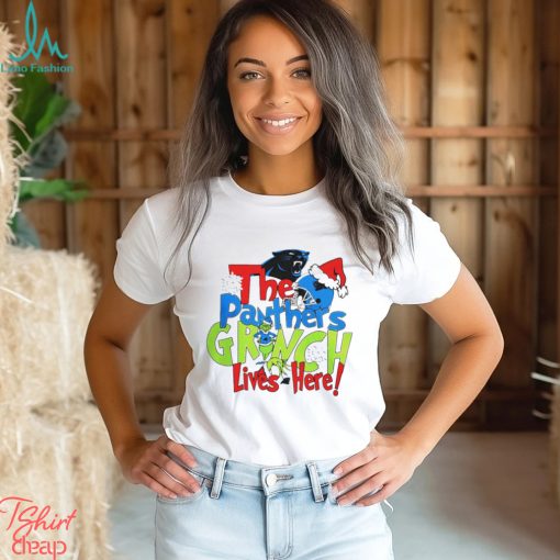 The Carolina Panthers football Grinch lives here Merry Christmas shirt