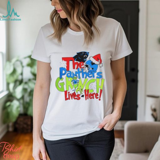 The Carolina Panthers football Grinch lives here Merry Christmas shirt