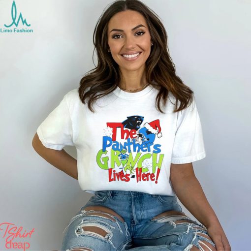 The Carolina Panthers football Grinch lives here Merry Christmas shirt