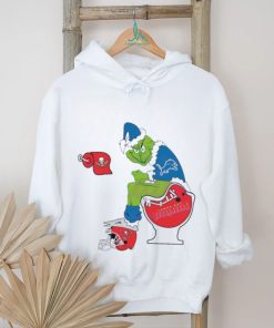 NFL Grinch Detroit Lions Sitting On Toilet Tampa Bay Buccaneers Shirt