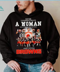 Never underestimate a woman who understands football Cleveland Browns and loves Browns signature shirt, hoodie, sweater, long sleeve and tank top Never underestimate a woman who understands football Cleveland Browns and loves Browns signature shirt