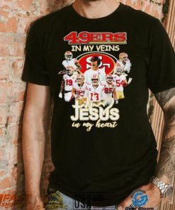 Top san Francisco 49ers team in my veins jesus in my heart shirt, hoodie, sweater, long sleeve and tank top Top san Francisco 49ers team in my veins jesus in my heart shirt