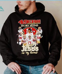 Top san Francisco 49ers team in my veins jesus in my heart shirt, hoodie, sweater, long sleeve and tank top Top san Francisco 49ers team in my veins jesus in my heart shirt