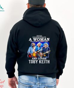 Never underestimate a woman who listens to Country Music and loves Toby Keith shirt