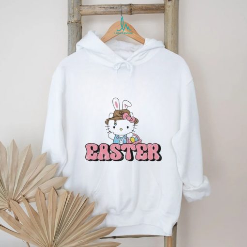 Kitty wearing hat Easter holding a basket of eggs shirt