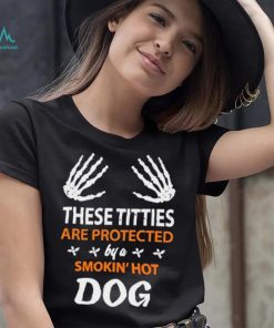 These Titties Are Protected By A Smokin’ Hot Dog shirt, hoodie, sweater, long sleeve and tank top These Titties Are Protected By A Smokin’ Hot Dog shirt