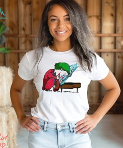 Joker playing the piano in the style of Peanuts shirt