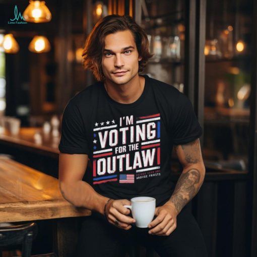 Official I’m Voting For The Outlaw – US Flag T Shirt