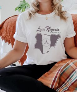 Official Meets With Robert Pattinson Wearing Love Nigeria Mowalola t shirt