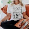 Official Meets With Robert Pattinson Wearing Love Nigeria Mowalola t shirt