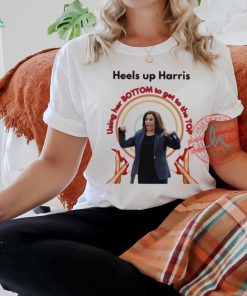 Heels up Harris using her bottom to get to the top shirt