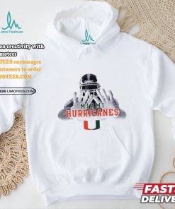 Football player garb Miami Hurricanes logo shirt